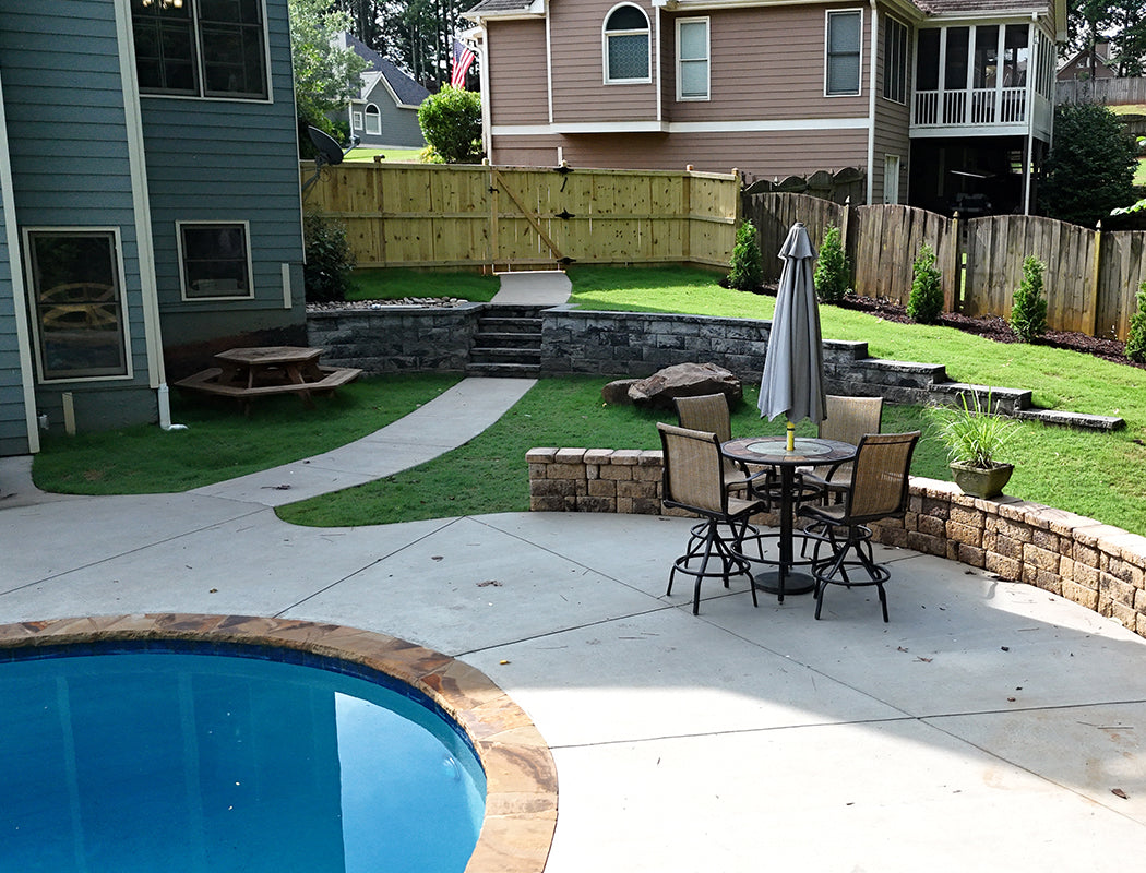 Backyard with pool, new patio, and outdoor furniture